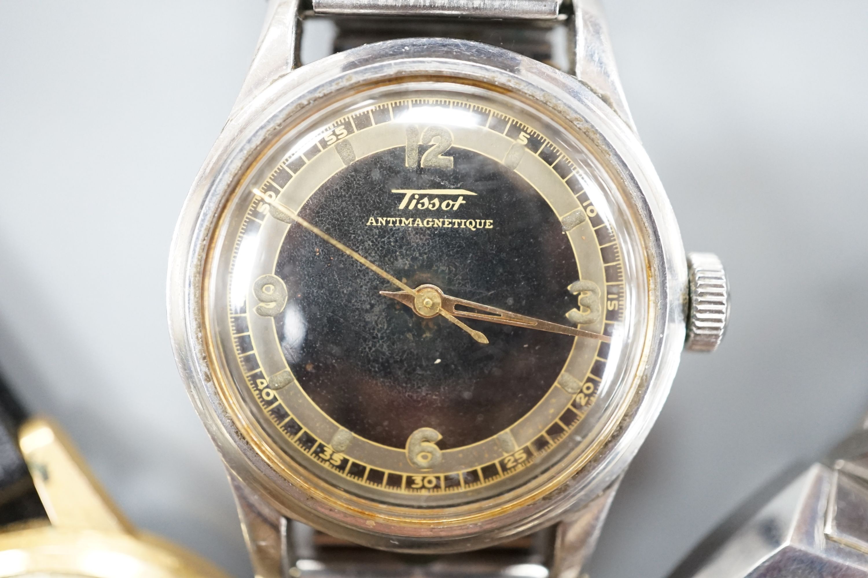 A gentleman's steel and gold plated Bucherer manual wind wrist watch, a steel Tissot watch and similar Seiko automatic watch.